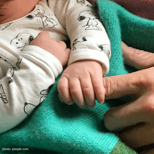 andy cohen baby benjamin hand hold finger